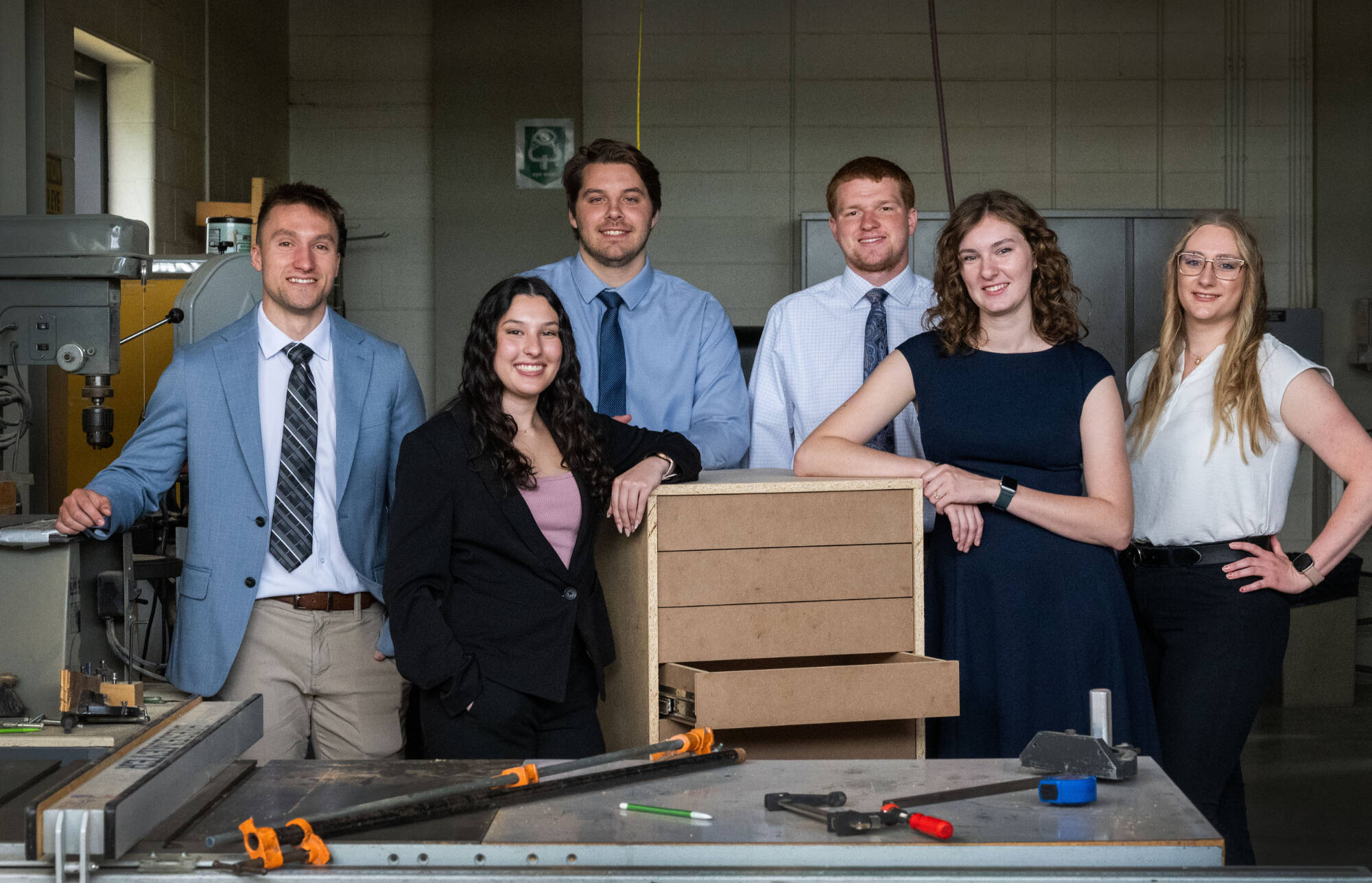 Team 6 standing with their project